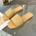 PRADA 26S SLIDE SANDALS IN NATURAL RAFFIA LEATHER TRIMMED