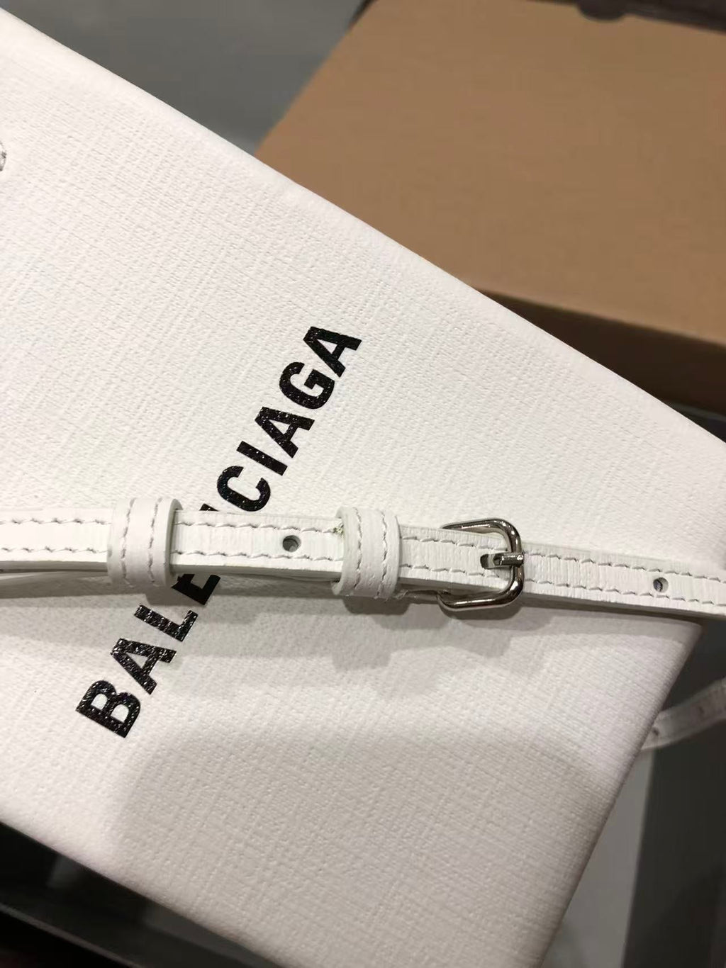 BALENCIAGA SHOPPING PHONE HOLDER 26S IN WHITE CAFLSKIN LEATHER