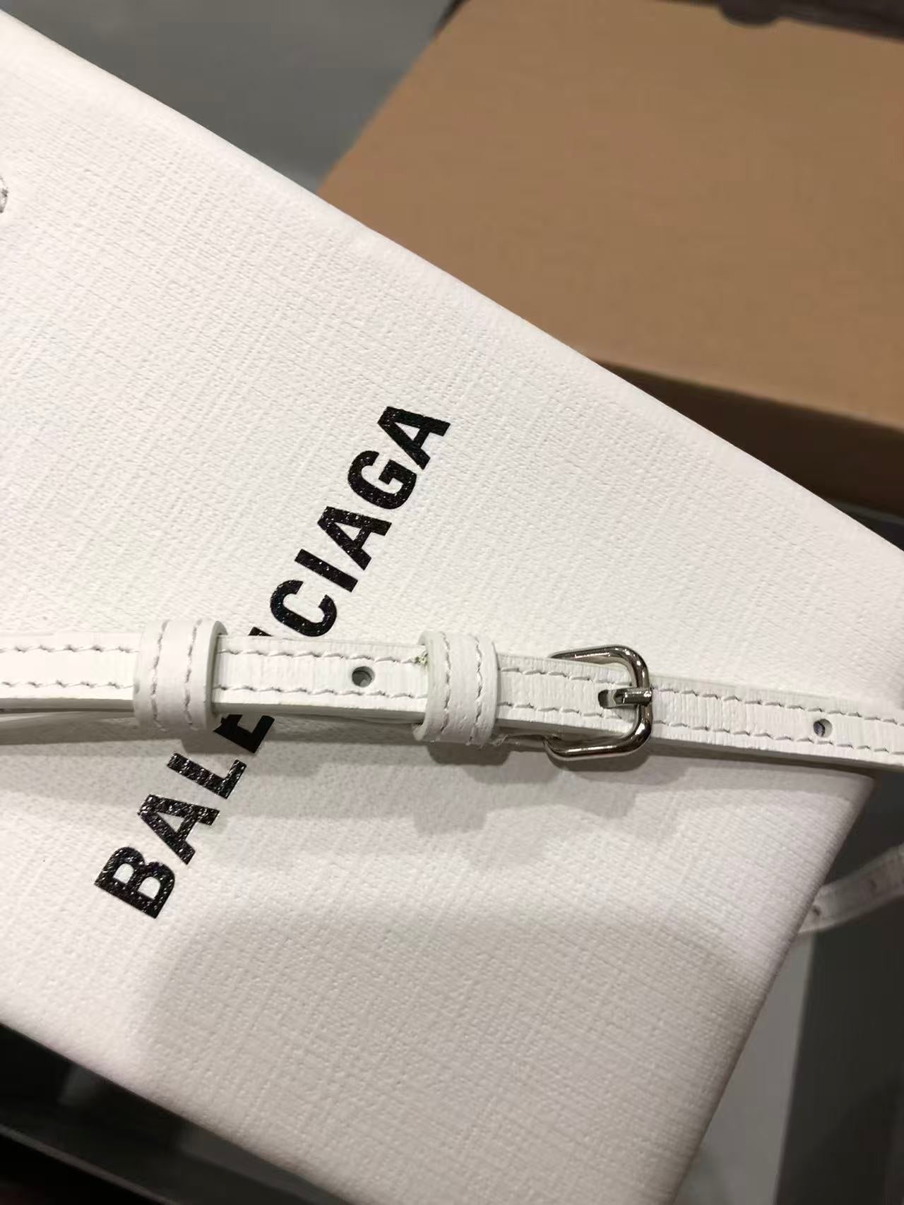BALENCIAGA SHOPPING PHONE HOLDER 26S IN WHITE CAFLSKIN LEATHER