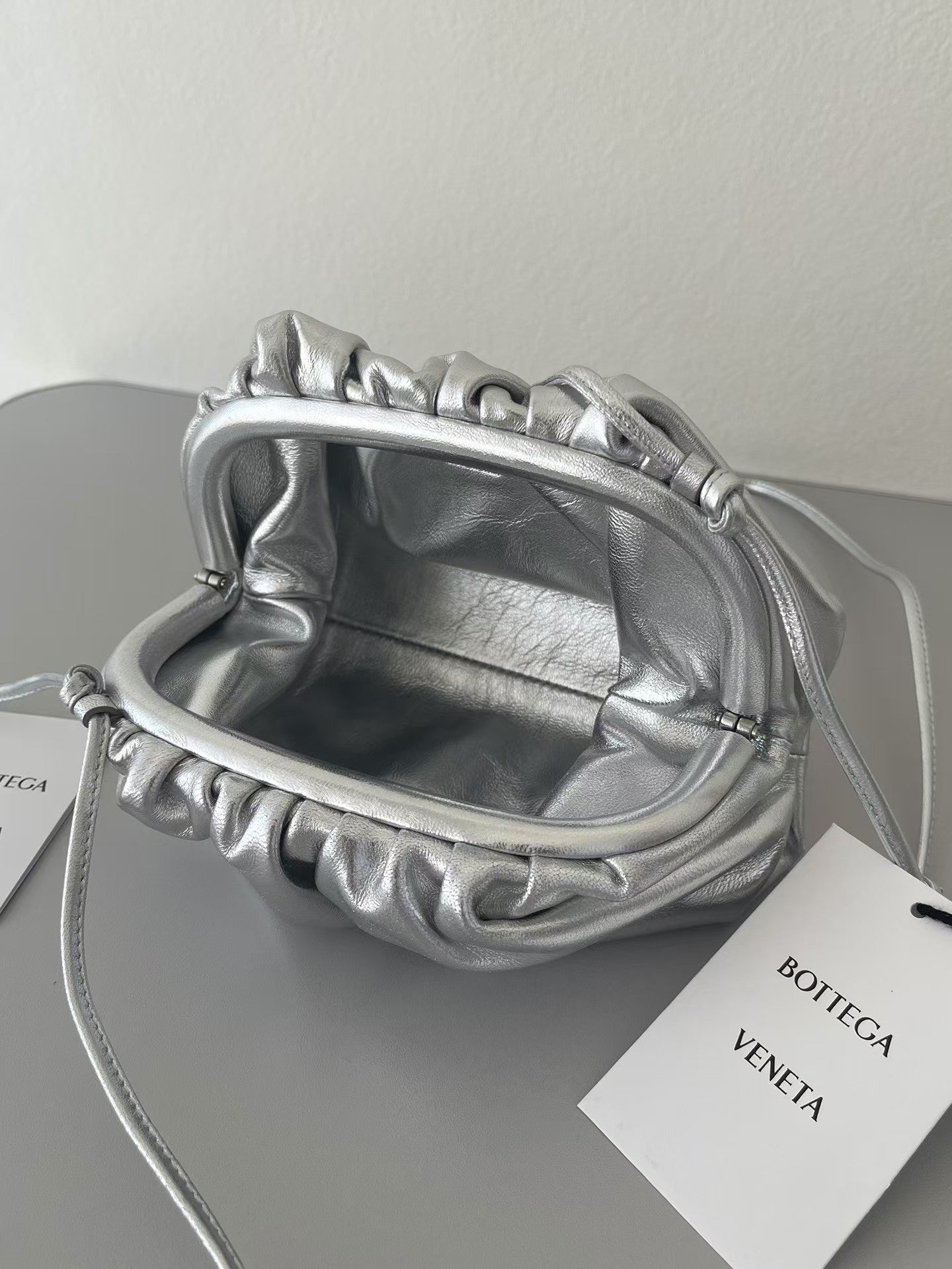 BOTTEGA VENETA 26S POUCH BAG IN SILVER METALLIC LEATHER