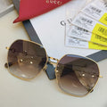 GUCCI 26S OVERSIZED HEXAGON IN GOLD GREW GRAY METAL
