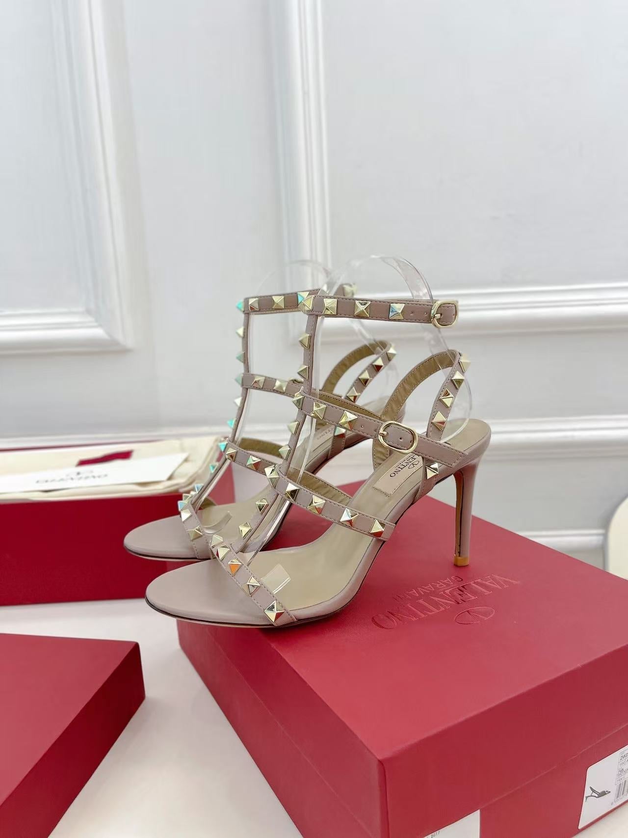 VALENTINO 26S ROCKSTUD CAGED SANDALS IN POWDER PINK CALFSKIN LEATHER