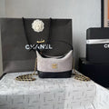 CHANEL 26S MINI BUCKET BAG IN BEIGE BLACK CAVIAR LEATHER