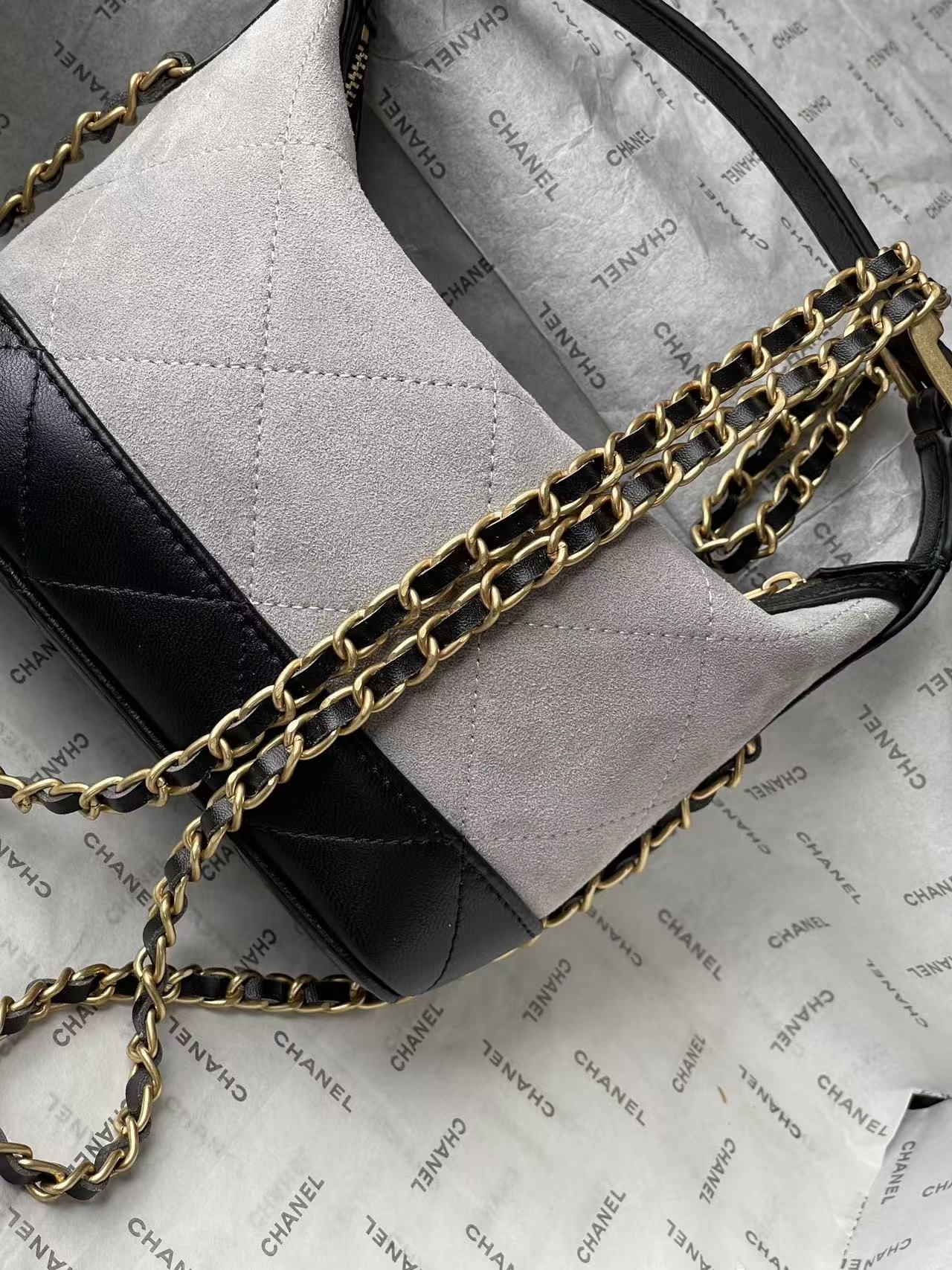 CHANEL 26S MINI BUCKET BAG IN BEIGE BLACK CAVIAR LEATHER