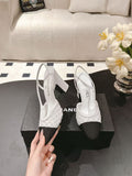 HIGH SLINGBACK 25S PUMP IN WHITE AND BLACK FARBIC