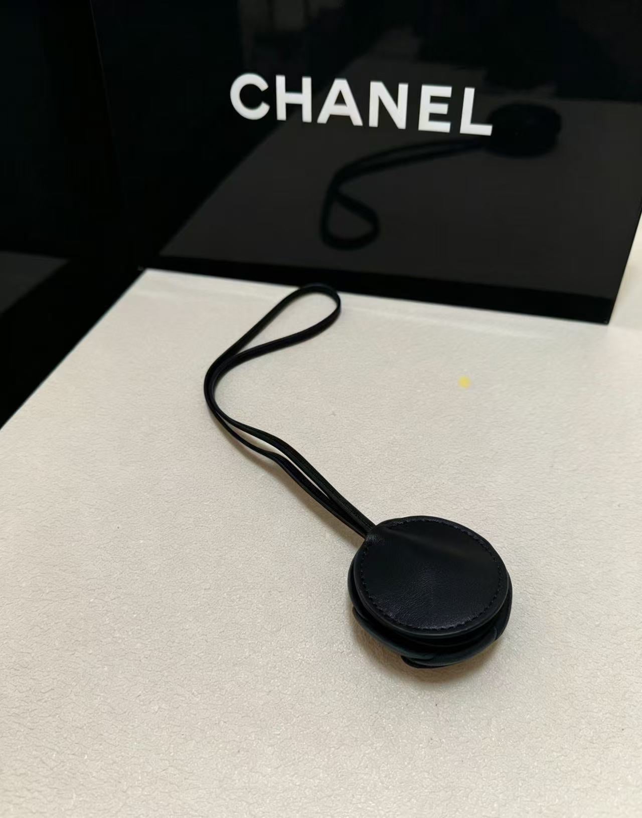 CHANEL CAMELLIA BAG CHARM IN BLACK LAMBSKIN