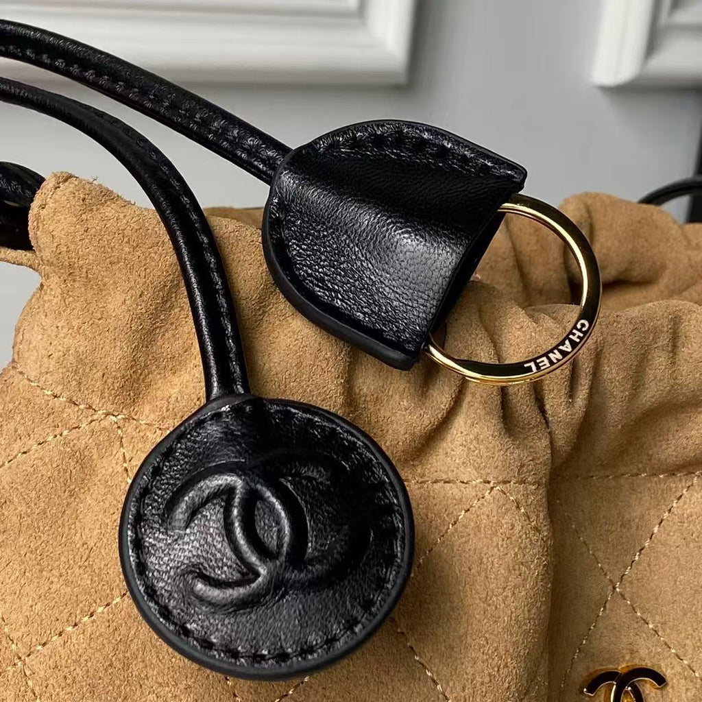 CHANEL 26S DRAWSTRING BUCKET BAG IN BROWN SUEDE