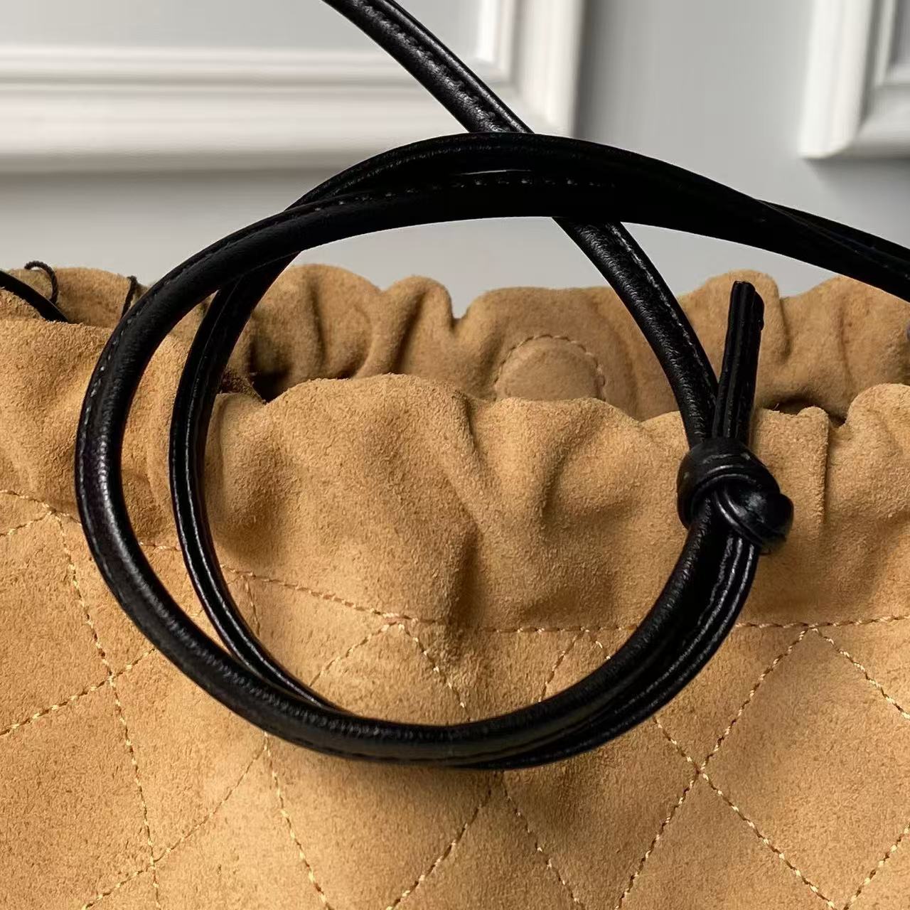 CHANEL 26S DRAWSTRING BUCKET BAG IN BROWN SUEDE