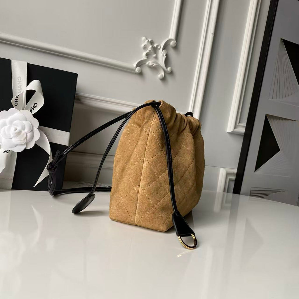 CHANEL 26S DRAWSTRING BUCKET BAG IN BROWN SUEDE