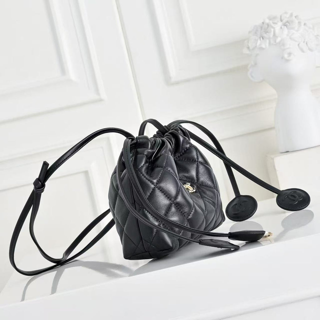 CHANEL 26S DRAWSTRING BUCKET BAG IN BLACK CALFSKIN