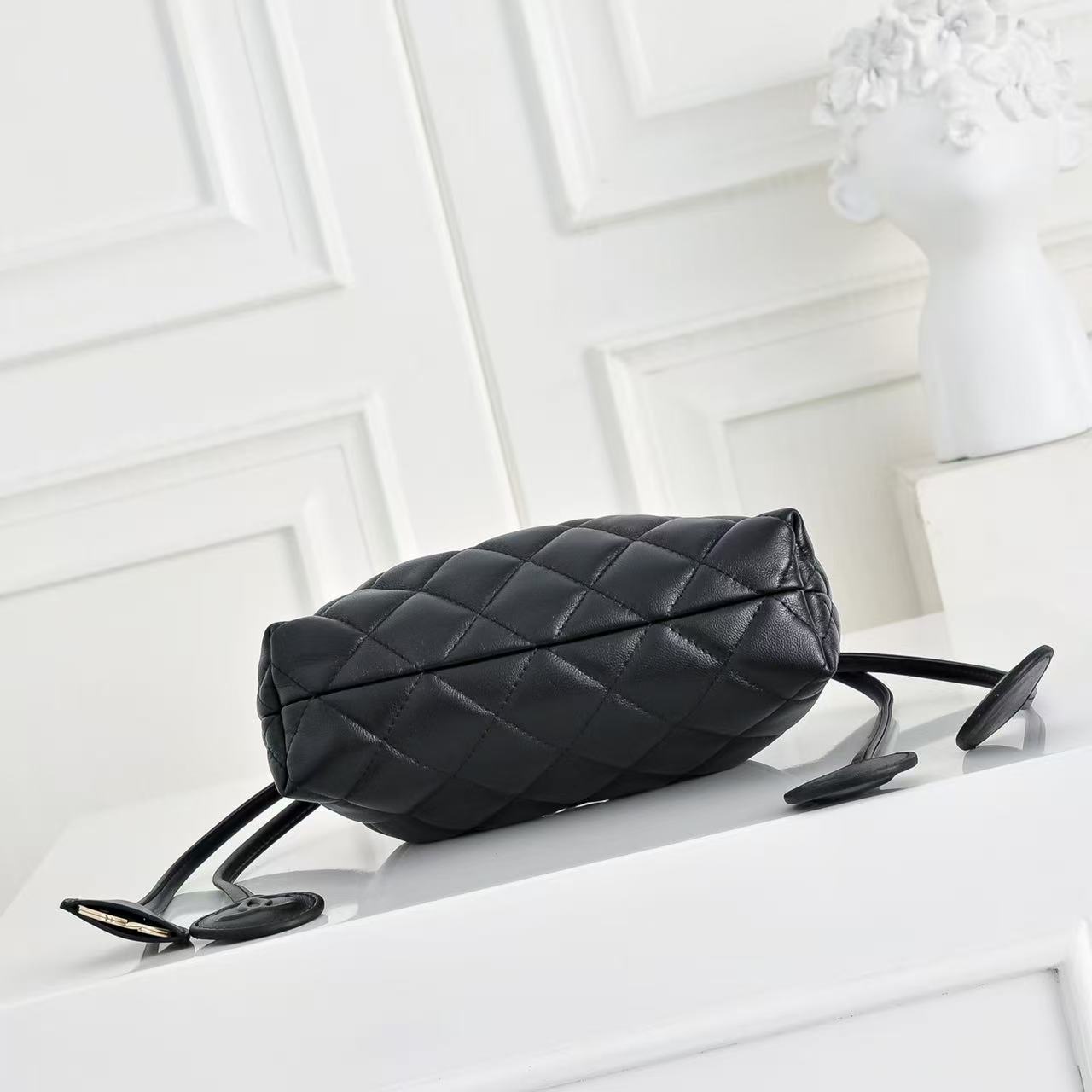CHANEL 26S DRAWSTRING BUCKET BAG IN BLACK CALFSKIN