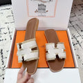 HERMES 26S ORAN FRINGED SLIDE SANDALS IN ECRU CANVAS