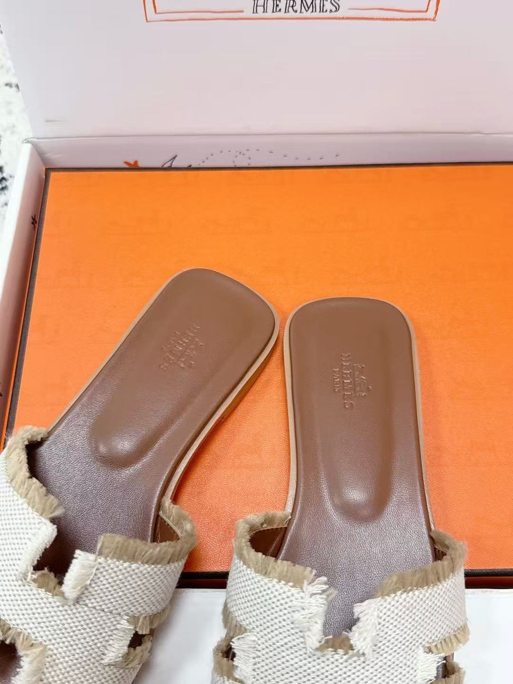 HERMES 26S ORAN FRINGED SLIDE SANDALS IN ECRU CANVAS