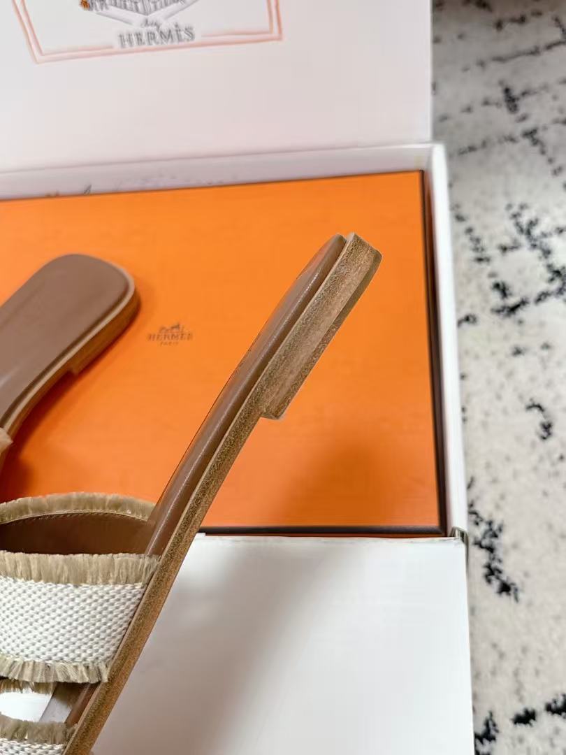 HERMES 26S ORAN FRINGED SLIDE SANDALS IN ECRU CANVAS