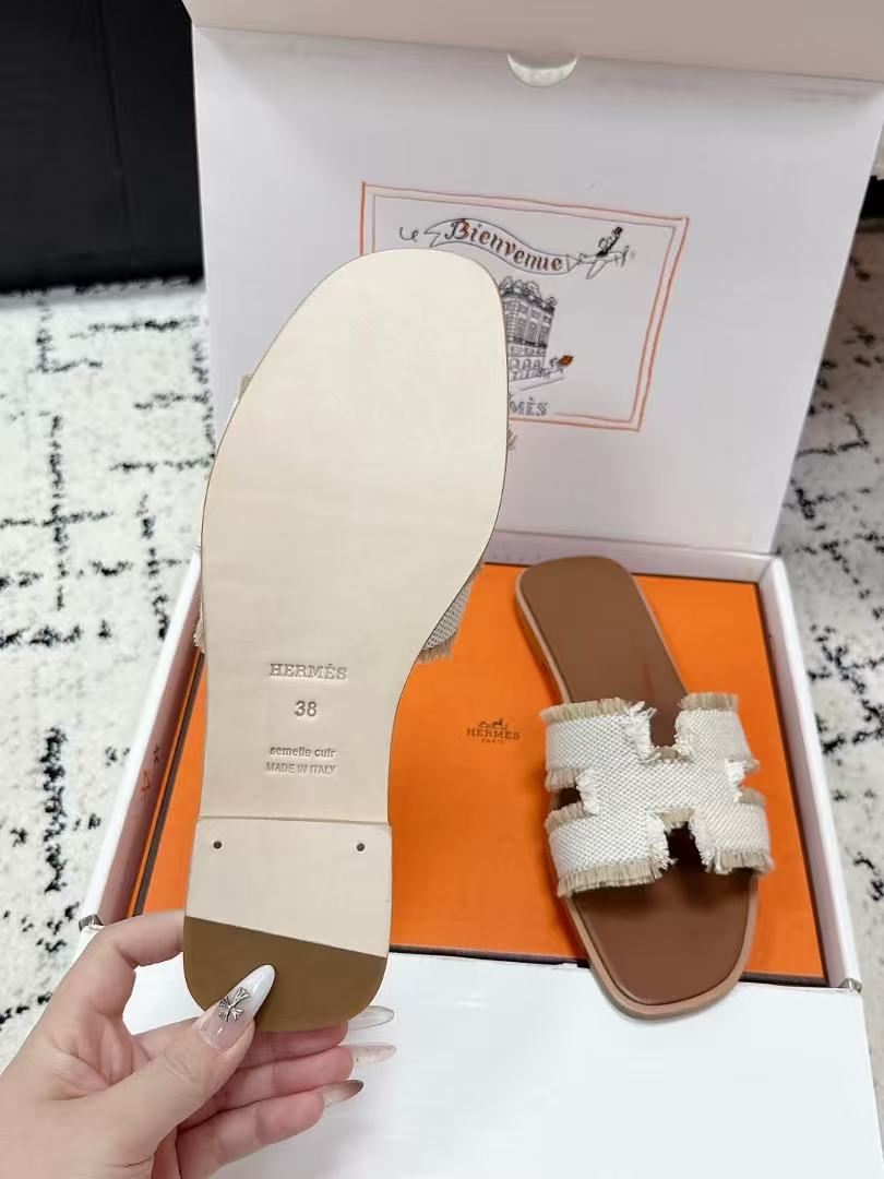 HERMES 26S ORAN FRINGED SLIDE SANDALS IN ECRU CANVAS