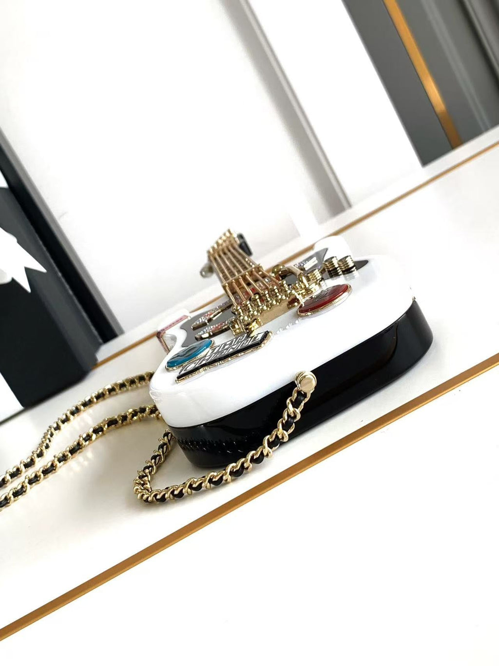CHANEL WHITE GUITAR MINAUDIERE BAG