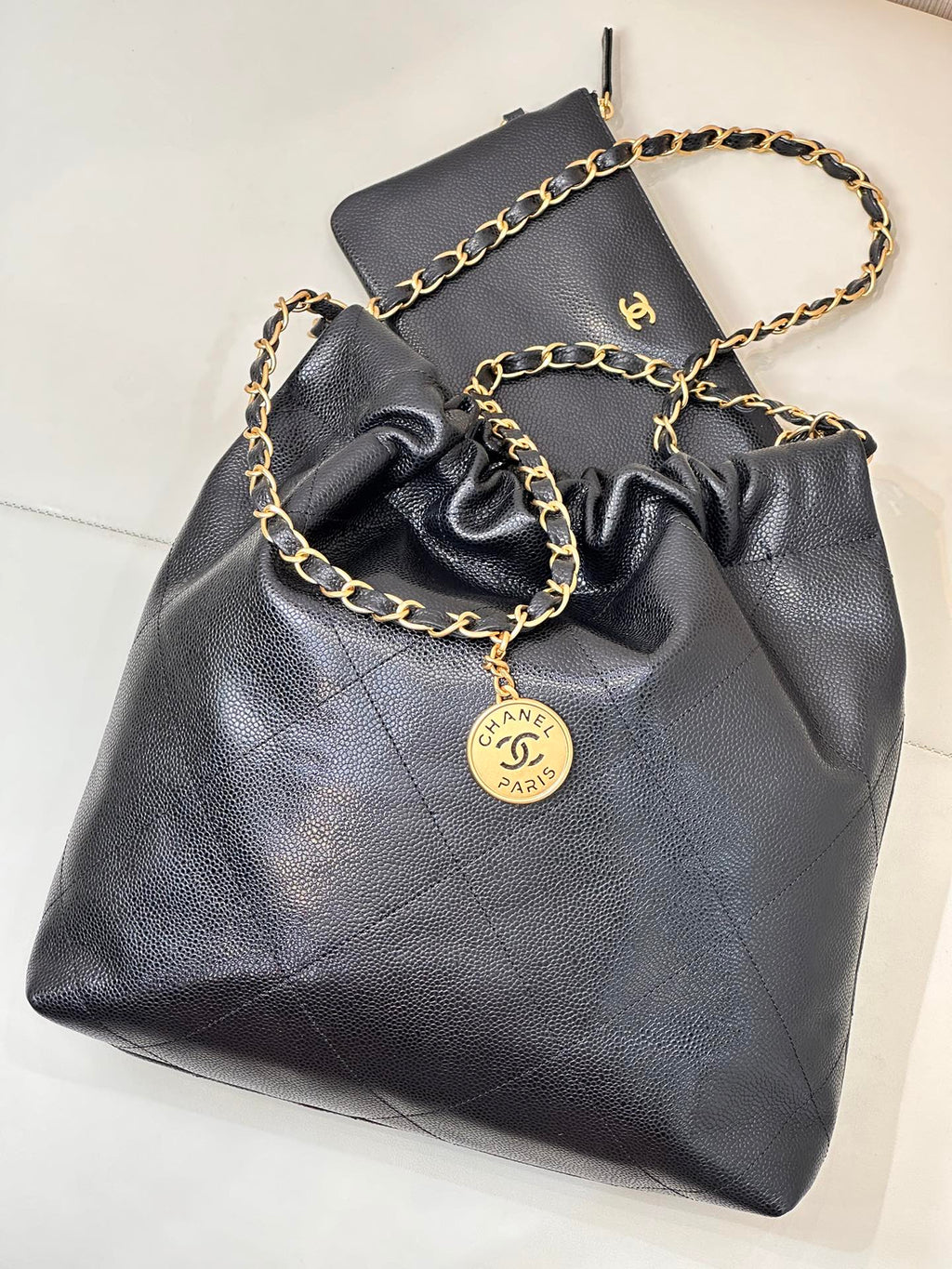 CHANEL 26S DRAWSTRING SHOULDER BAG 22 IN BLACK CAVIAR CALFSKIN