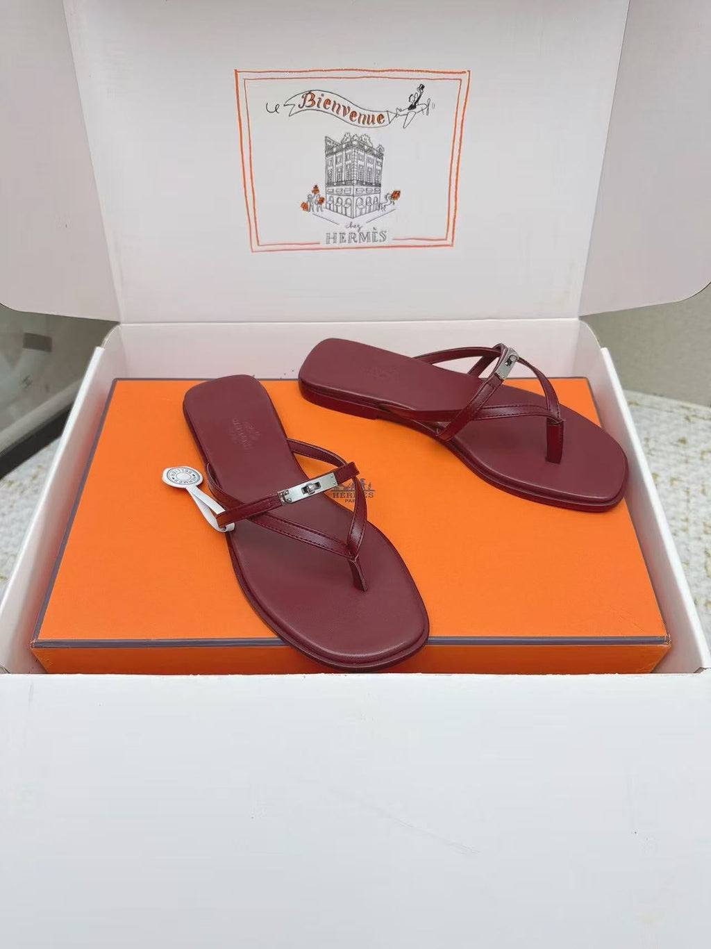 HERMÈS 26S ORAN SANDAL IN BURGUNDY CALFSKIN