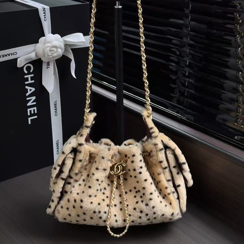 CHANEL 26S DRAWSTRING SHOULDER BAG IN LEOPARD PRINT FAUX FUR