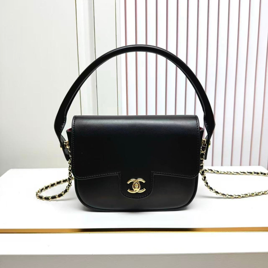 CHANEL 26S METIERS D'ART POCHETTE IN BLACK CALFSKIN GOLD HARDWARE