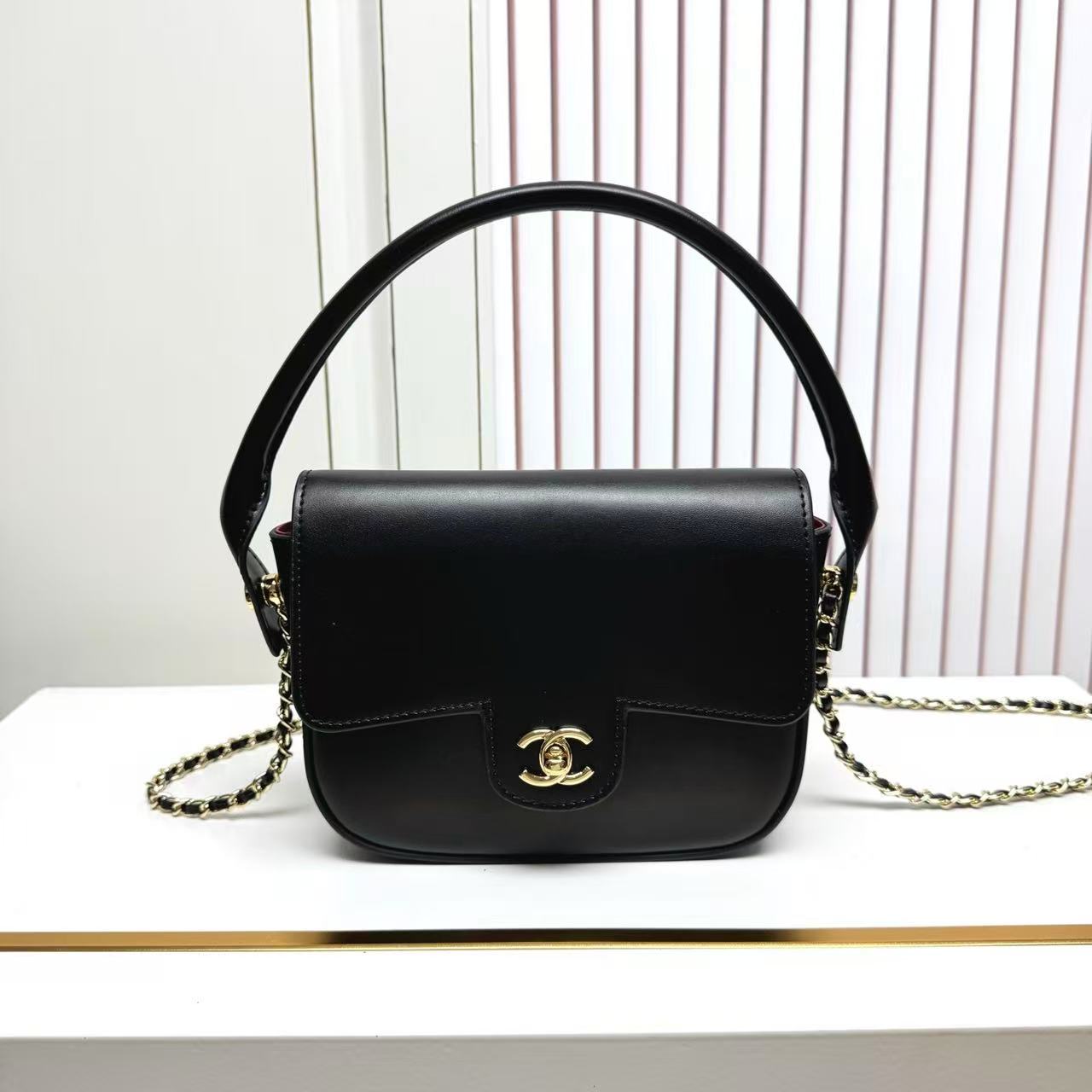 CHANEL 26S METIERS D'ART POCHETTE IN BLACK CALFSKIN GOLD HARDWARE