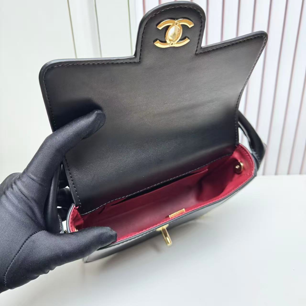 CHANEL 26S METIERS D'ART POCHETTE IN BLACK CALFSKIN GOLD HARDWARE