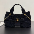 CC BOW TOP HANDLE BAG 38 IN BLACK