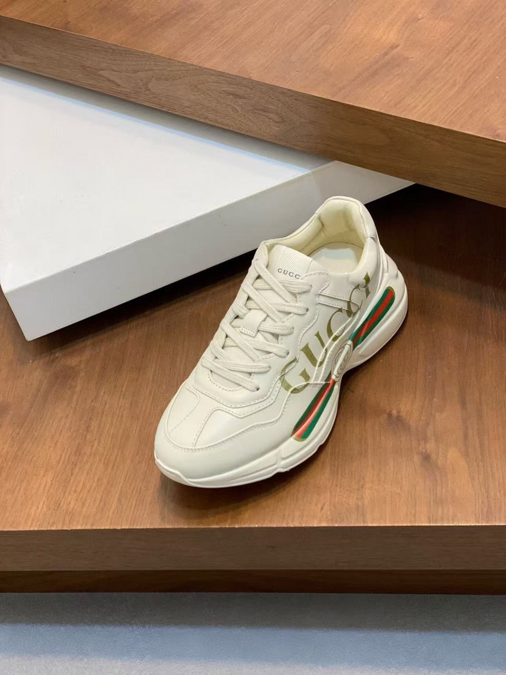 GG RHYTON LOGO-PRINT TRAINERS IN BEIGE CALFSKIN