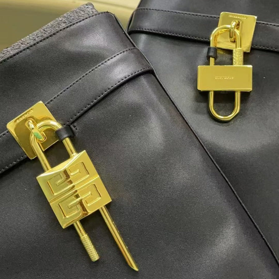 SHARK LOCK BOOTS IN BLACK CALFSKIN GOLD HARDWARE
