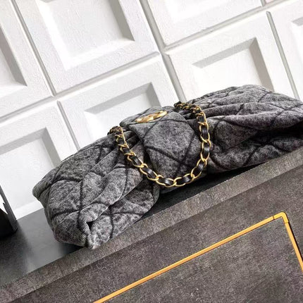 CC MAXI BOW BAG 38 IN BLACK DENIM WITH GOLD HARDWARE