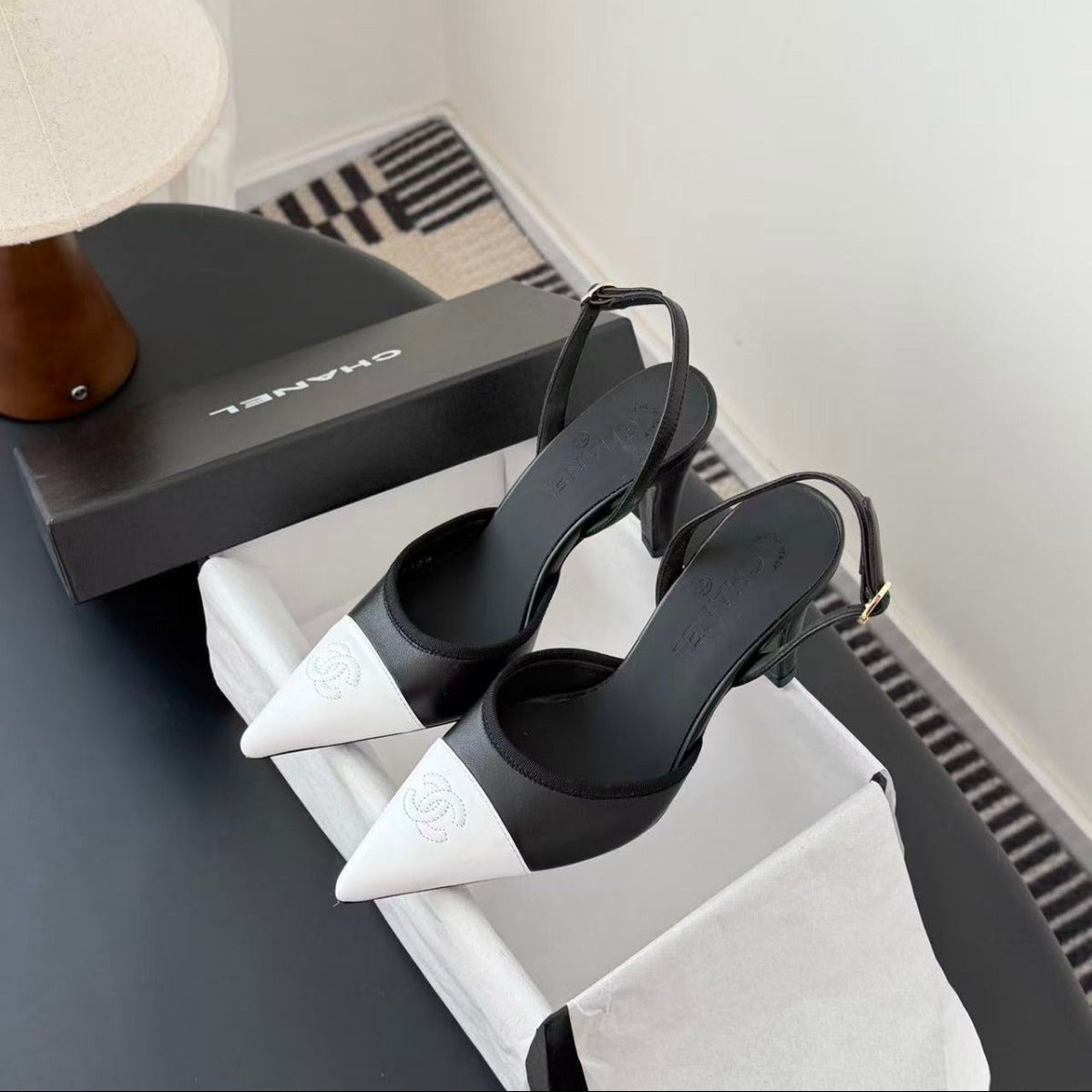 CHANEL POINTED TOE SLINGBACK PUMPS IN BLACK AND WHITE CALFSKIN