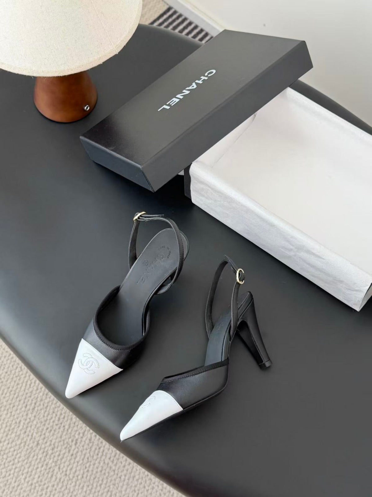 CHANEL POINTED TOE SLINGBACK PUMPS IN BLACK AND WHITE CALFSKIN