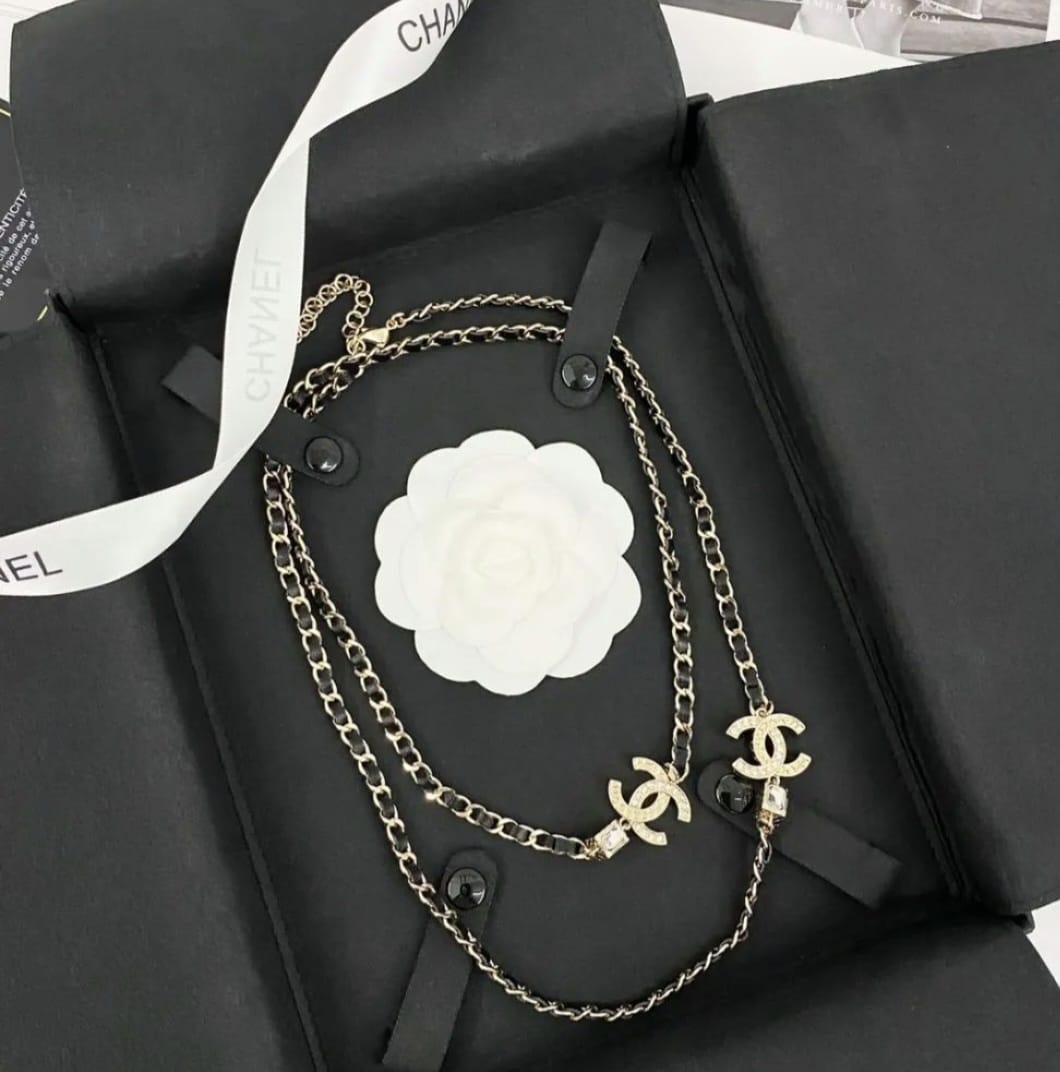 GOLD-TONE CHANEL CHAIN BELT WITH BLACK ENAMEL AND CRYSTAL-ENCRUSTED INTERLOCKING CC CHARMS
