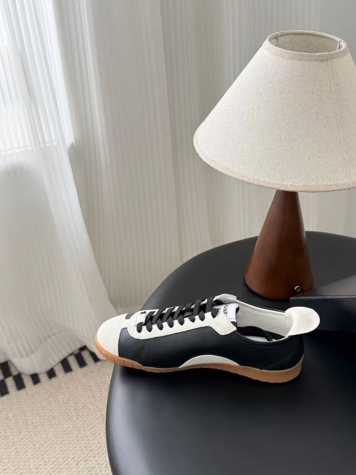 CHANEL TRAINERS IN BLACK AND WHITE CALFSKIN AND EMBOSSED SUEDE CALFSKIN