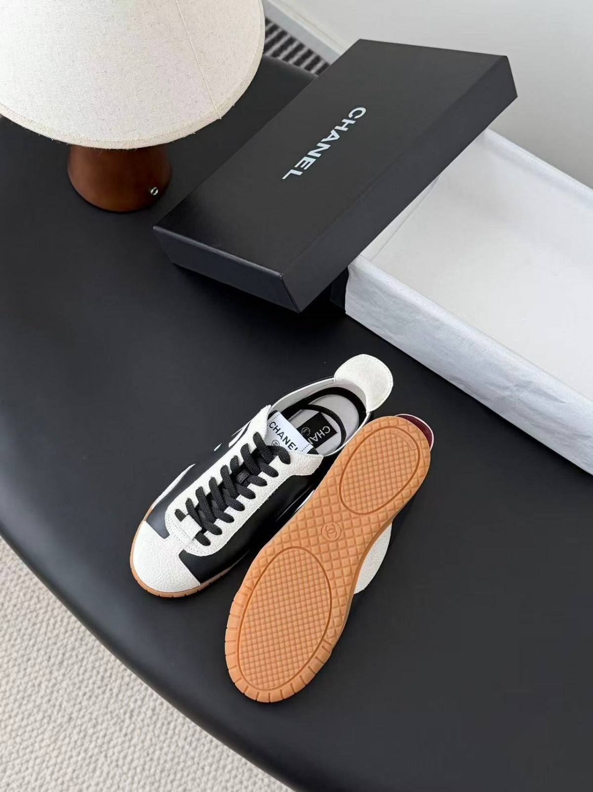 CHANEL TRAINERS IN BLACK AND WHITE CALFSKIN AND EMBOSSED SUEDE CALFSKIN