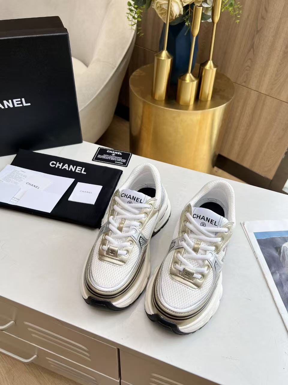 CHANEL RUNNER SNEAKERS IN GOLD LAMINATE COLORWAY MESH