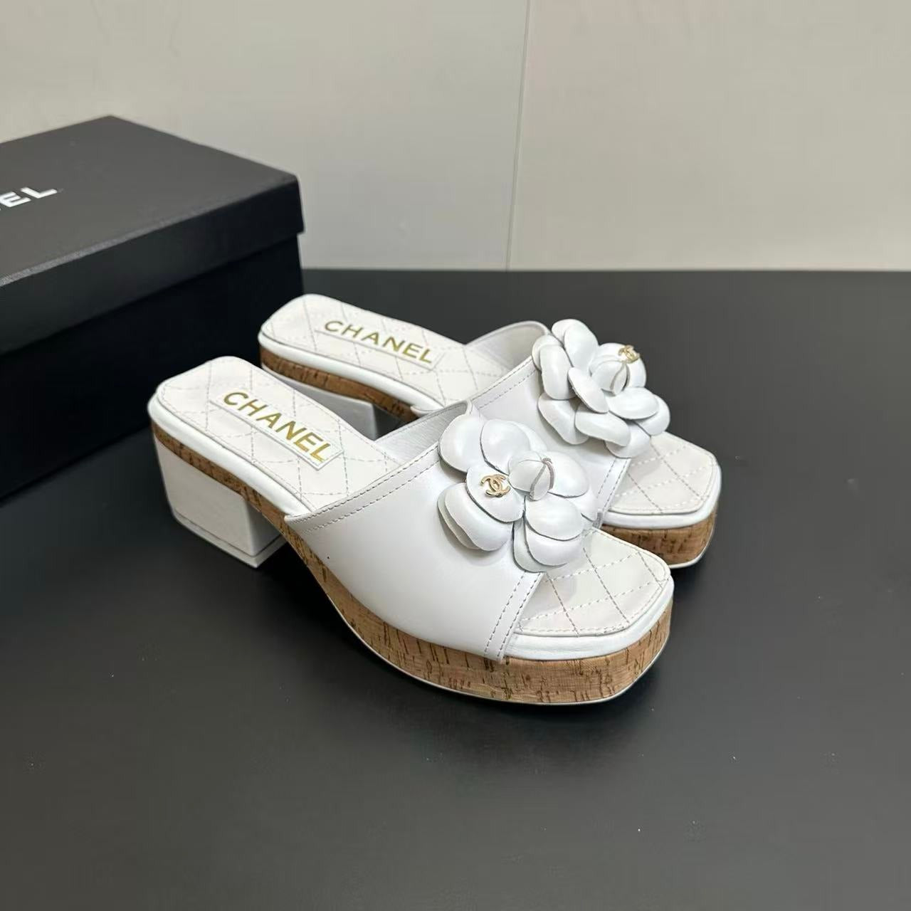 CHANEL CAMELLIA SLIDE SANDALS IN WHITE CALFSKIN