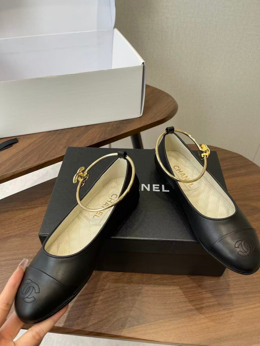 CHANEL GOLD ANKLE STRAP BALLET FLATS IN BLACK CALFSKIN