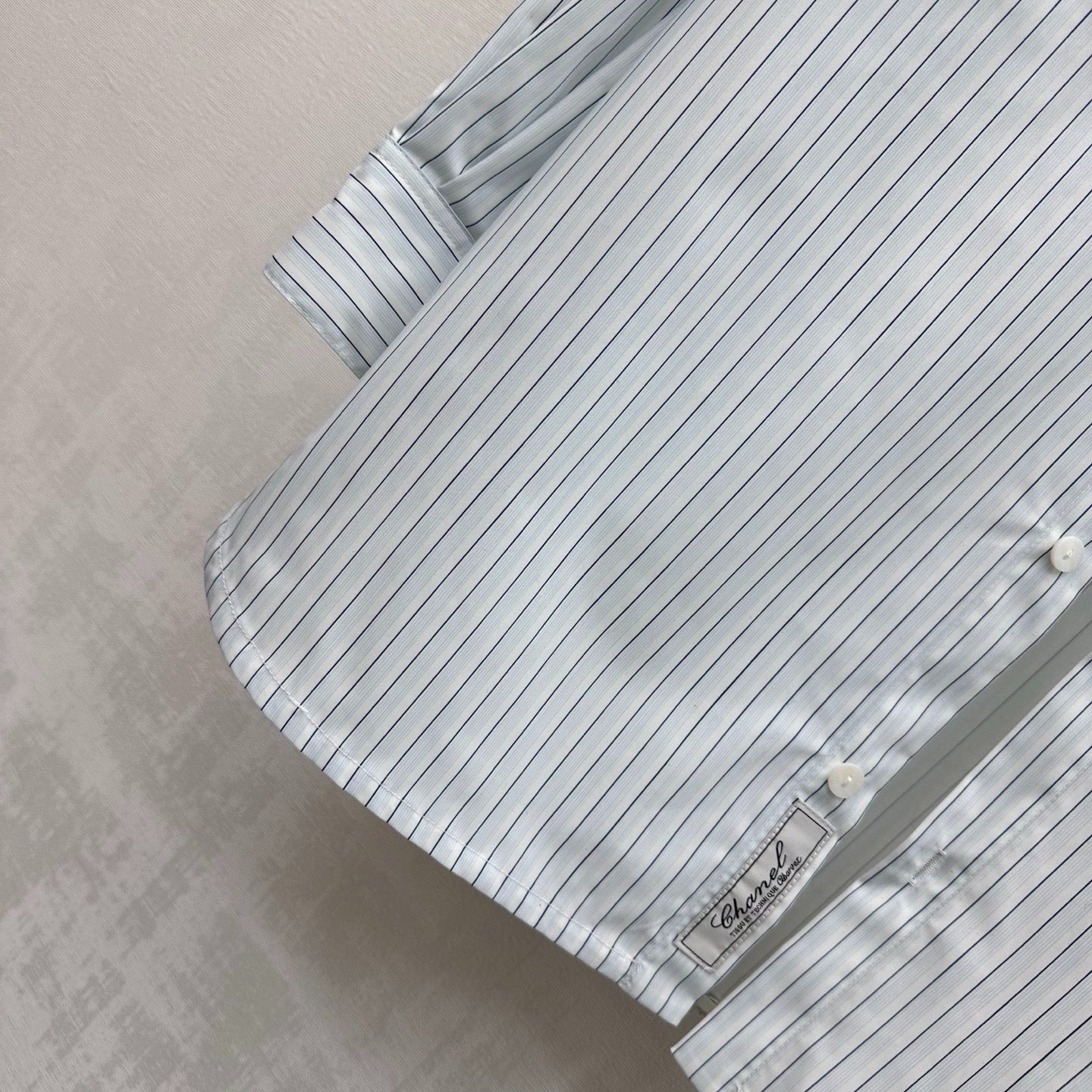 CHANEL STRIPED EMBROIDERED LOGO SHIRT WITH VERTICAL STRIPES