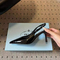 PRADA POINTED TOE PUMPS IN BLACK SHINY CALFSKIN