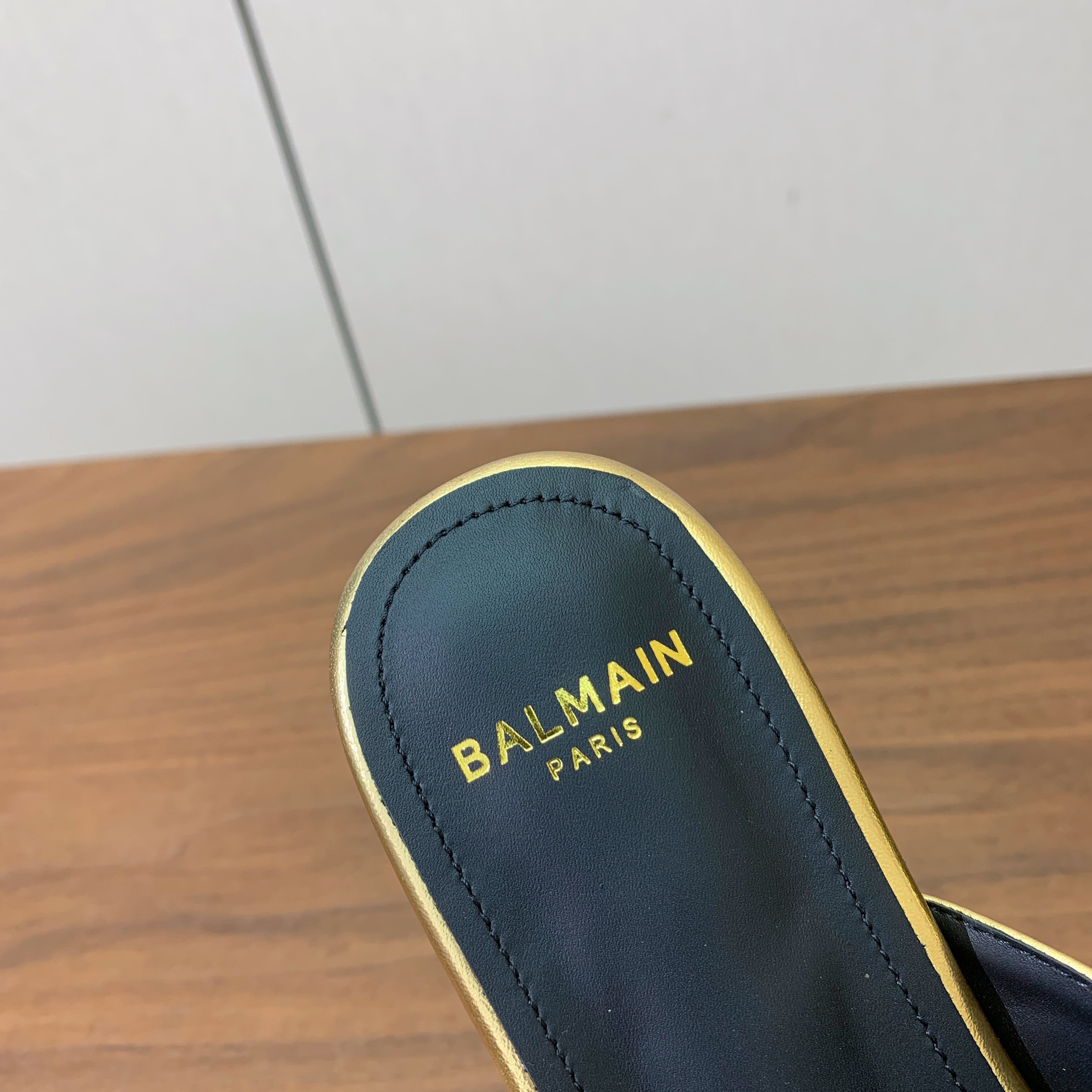 BALMAIN 26S B-BELT FLAT SANDALS IN METALLIC GOLD CALFSKIN