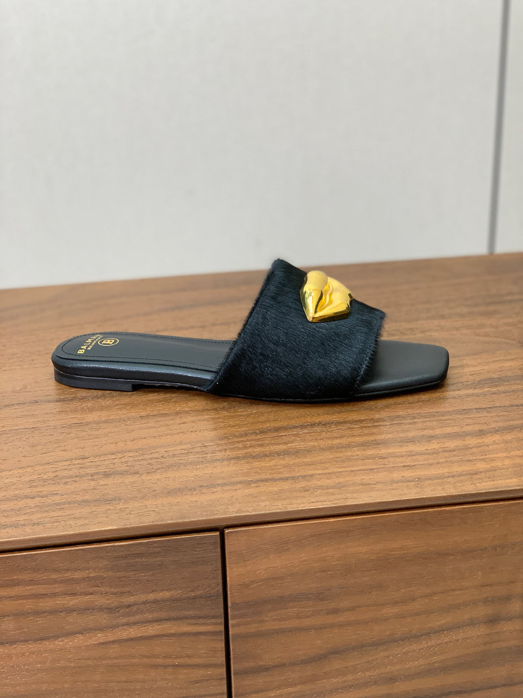 BALMAIN 26S LIP-EMBELLISHED SLIDES IN BLACK PONY HAIR WITH GOLD HARDWARE