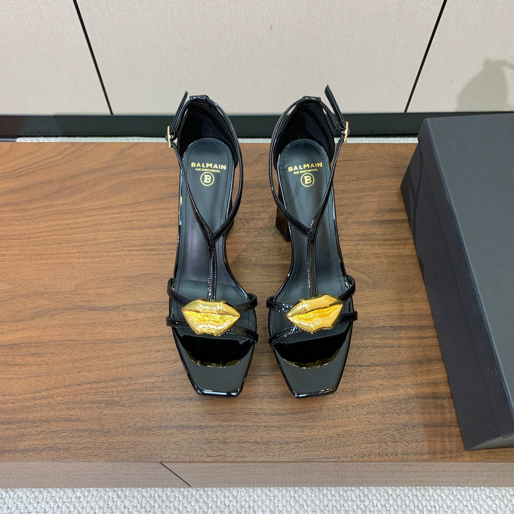 BALMAIN 26S LIP-EMBELLISHED HEELS 105 MM IN BLACK CALFSKIN WITH GOLD HARDWARE