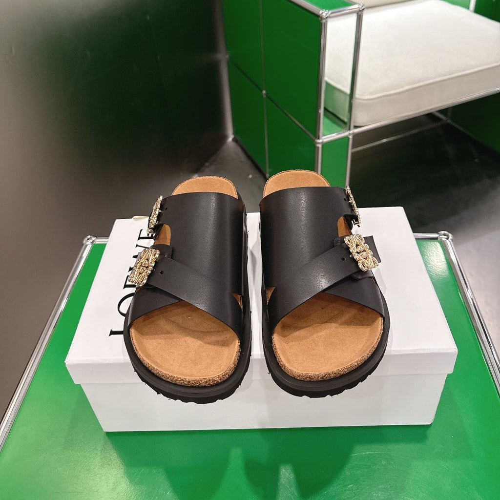 LOEWE 26S ANAGRAM FLAT SLIDES IN BLACK CALFSKIN