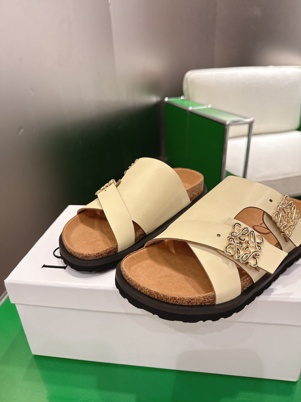 LOEWE 26S ANAGRAM FLAT SLIDES IN BEIGE CALFSKIN