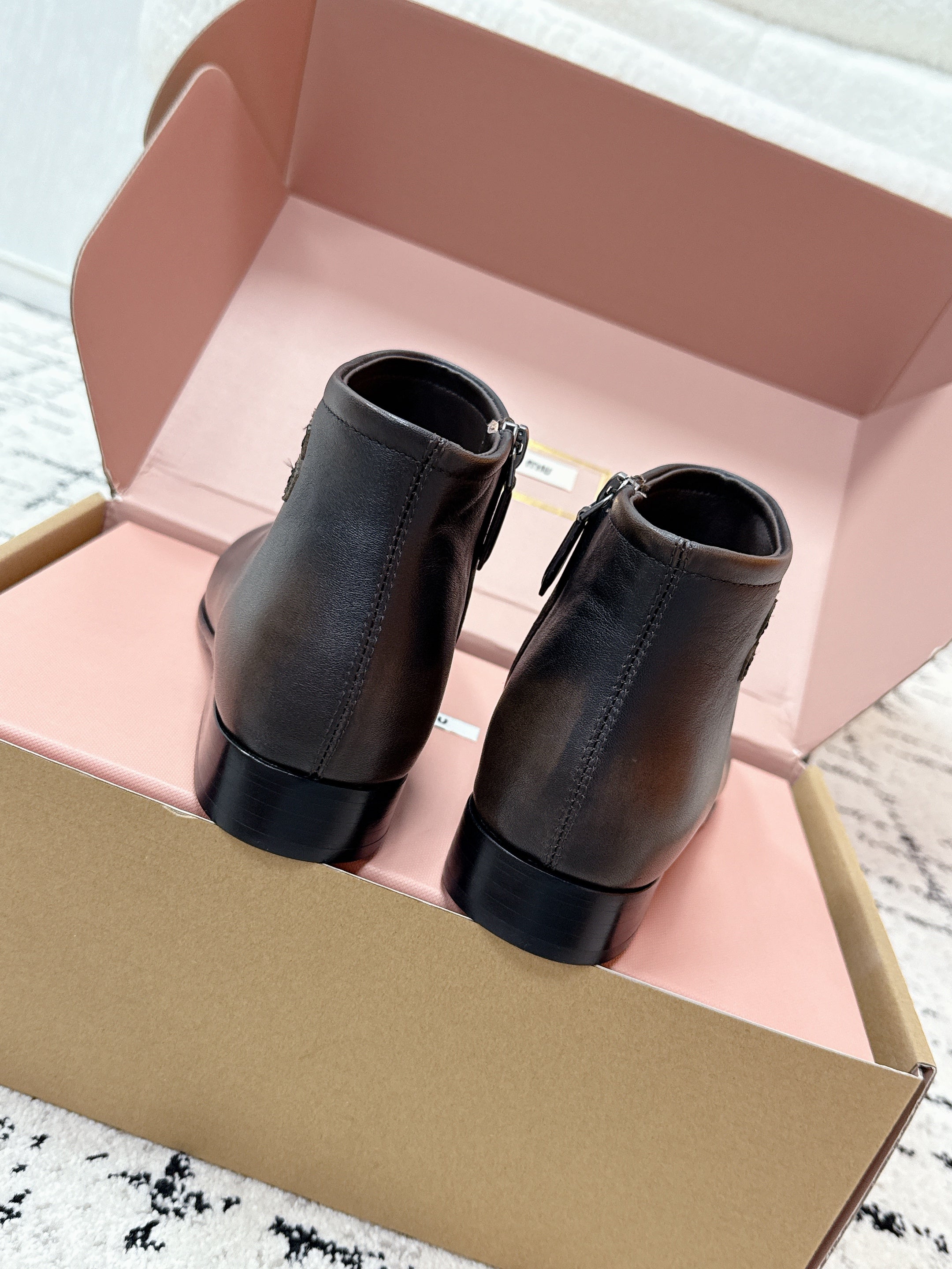 MIUMIU 26S BOOTIES IN DARK BROWN  FUME CALFSKIN