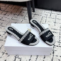 DIOR 26S HIGH HEEL SLIDES IN BLACK AND WHITE EMBOSSED OBLIQUE LACE EMBROIDERY