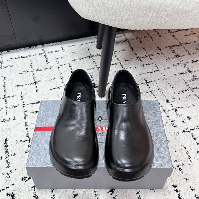 PRADA 26S SLIP ON SHOES IN BLACK SMOOTH CALFSKIN