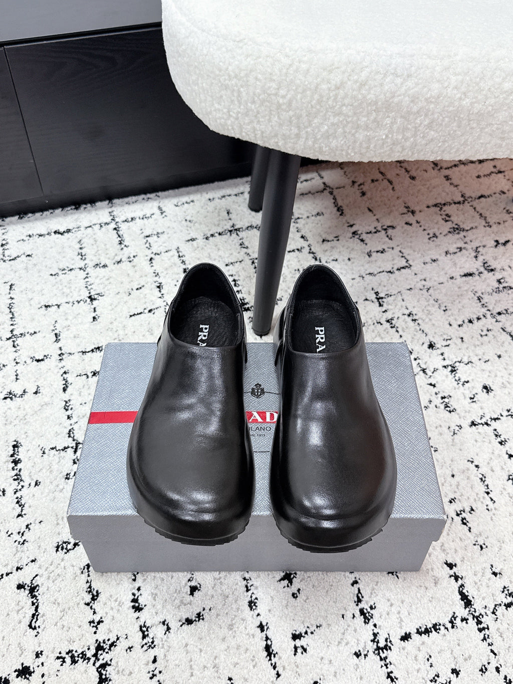 PRADA 26S SLIP ON SHOES IN BLACK SMOOTH CALFSKIN