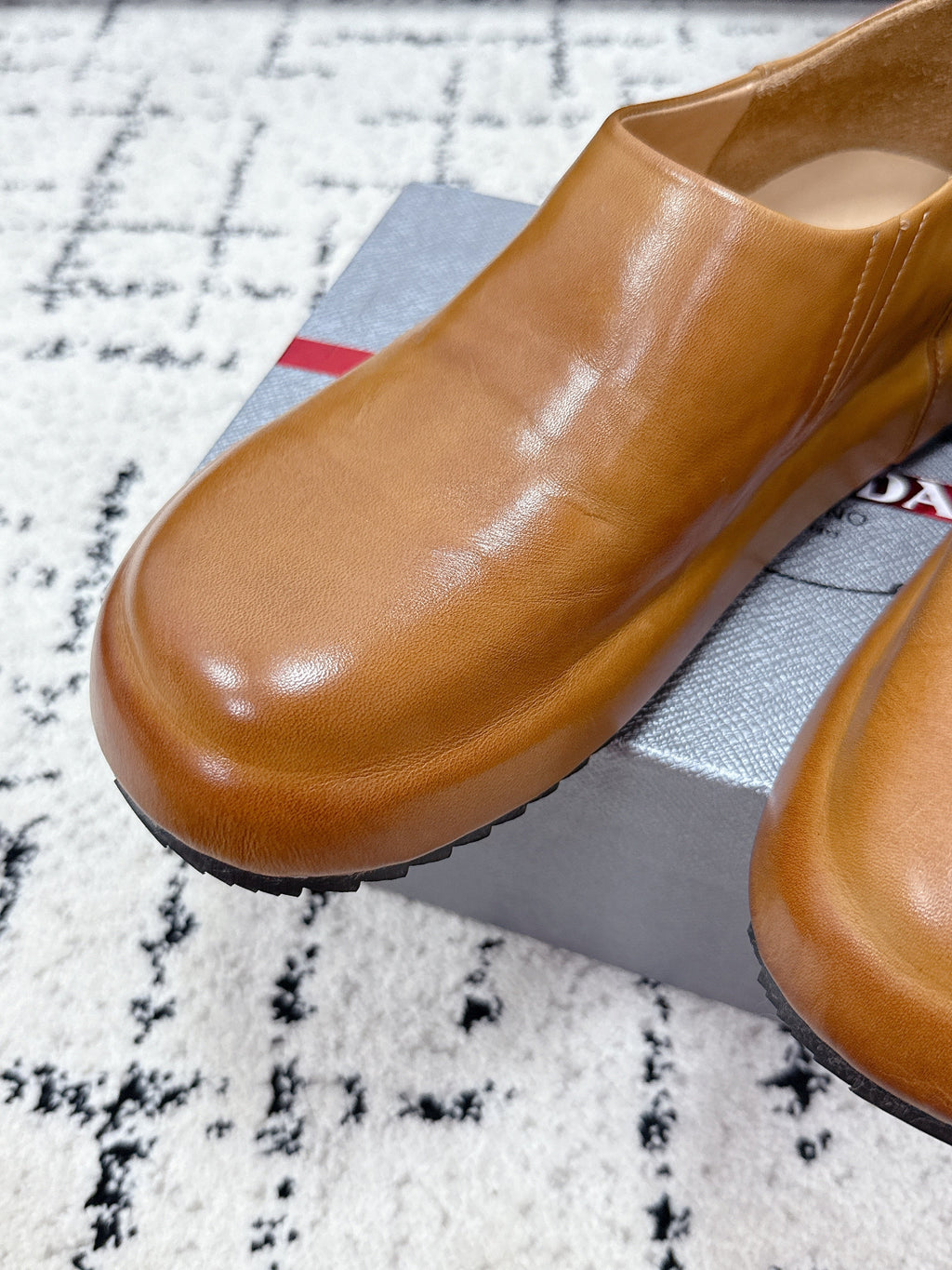 PRADA 26S SLIP ON SHOES IN WARM BROWN SMOOTH CALFSKIN